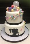 Birthday cake with silhouette of a girl and the bubbles